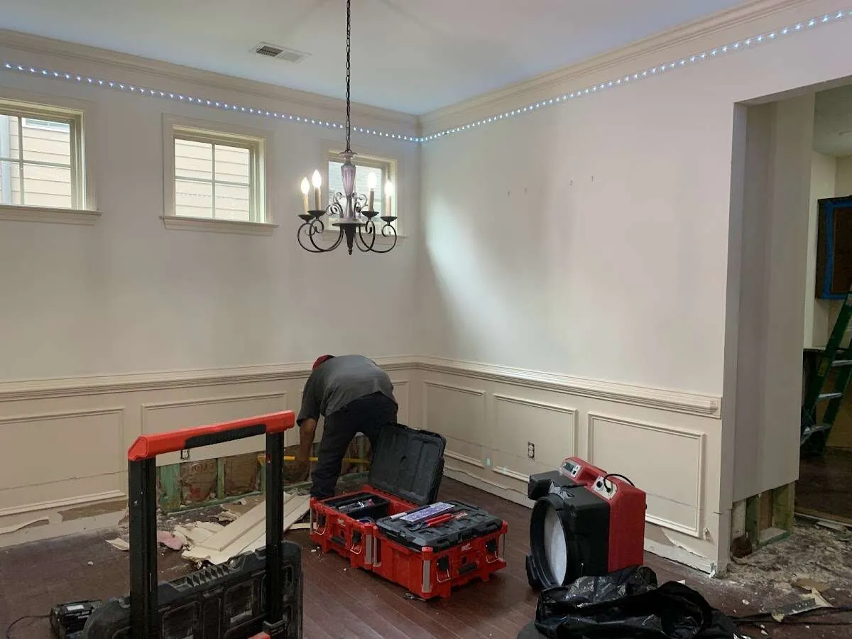 Restoration technician with professional equipment in Stoneham